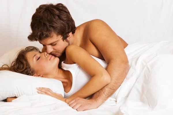 Couple resting comfortably in a bright bedroom — lifestyle imagery used for the Horsewood page